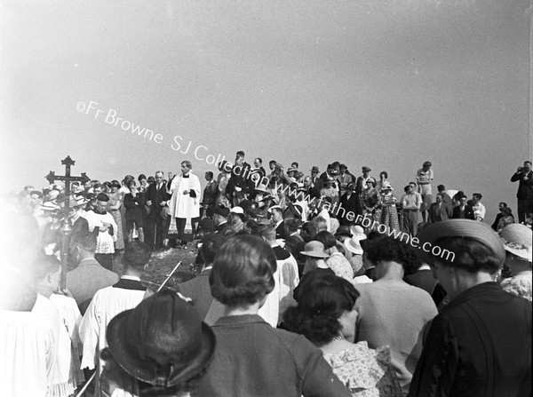 FR MARTIN D'ARCJ S.J. PREACHING TO PILGRIMS